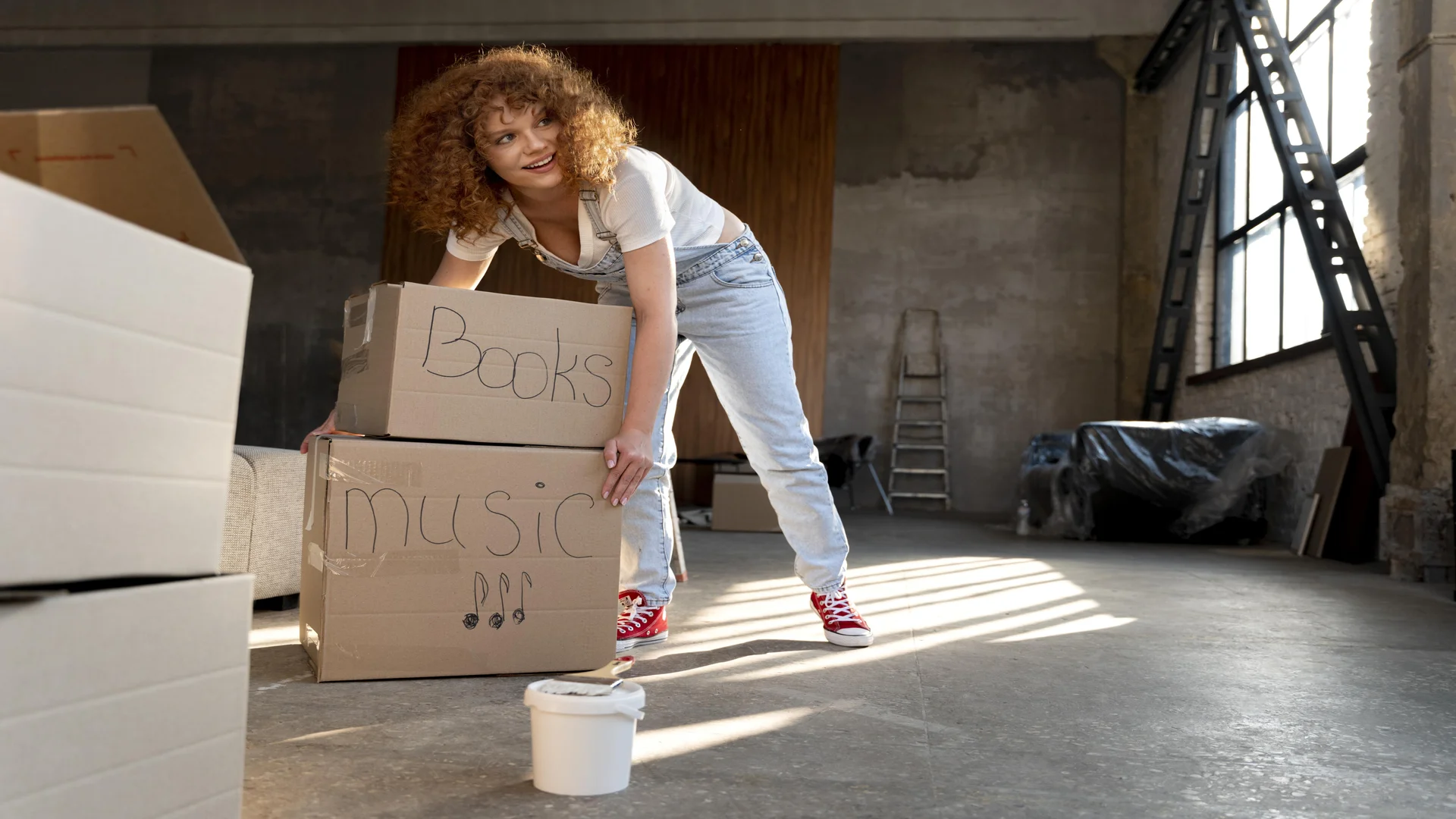 woman sorting boxes and prepare to moving